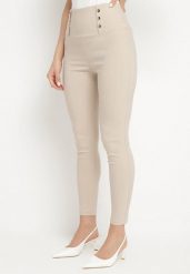 Jasnobeżowe Legginsy z Wysokim Stanem Ozdobione Guzikami Kolithra. Brązowe legginsy damskie Born2be, l, bez wzorów, z jeansu. Za 39.99 zł.