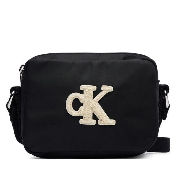 Torebka Calvin Klein Jeans. Czarne listonoszki damskie Calvin Klein Jeans, bez wzorów, z jeansu, bez dodatków. Za 189.99 zł.