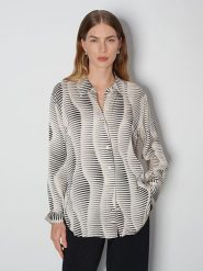 Someday Bluzka w kolorze beżowo-czarnym rozmiar: 38. Brązowe bluzki damskie someday., bez wzorów, z wiskozy, bez kołnierzyka, bez ramiączek. Za 143.99 zł.