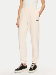 Guess Spodnie dresowe V5RB02 KCLD1 Écru Regular Fit. Spodnie dresowe damskie Guess, xl, z aplikacjami, z dresówki. Za 179.99 zł.