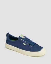 Tenisówki Cariuma OCA Low Shadow Blue Canvas. Niebieskie trampki damskie CARIUMA, bez wzorów, z gumy, bez zapięcia. Za 215.25 zł.