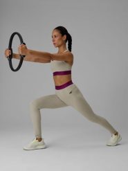 4F Legginsy treningowe szybkoschnące damskie - beżowe L. Brązowe legginsy damskie 4F, l, bez wzorów, z podwyższonym stanem, na fitness i siłownię. Za 169.99 zł.
