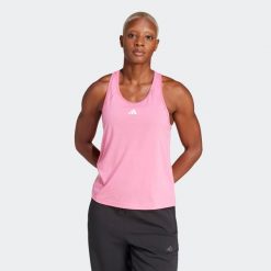 Koszulka fitness damska ADIDAS bez rękawów. Czerwone koszulki damskie Adidas, l, bez wzorów, z materiału, bez kołnierzyka, bez ramiączek. W wyprzedaży za 79.99 zł.