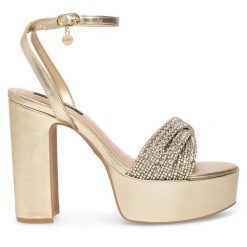 Sandały Nine West. Żółte sandały damskie Nine West, bez wzorów, bez obcasa, na słupku, bez zapięcia. Za 155.99 zł.
