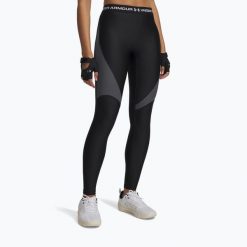Legginsy Under Armour HeatGear Rib. Czarne legginsy damskie Under Armour, bez wzorów. Za 189.99 zł.