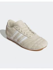 Adidas Skórzane sneakersy "Taekwondo Lace" w kolorze beżowym rozmiar: 37. Brązowe obuwie sportowe damskie Adidas, bez zapięcia. Za 247.11 zł.