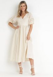 Beżowa Sukienka Maxi z Bawełny i Lnu z Ażurowymi Wstawkami i Gumką w Pasie Arada. Brązowe sukienki damskie Born2be, w ażurowe wzory, z bawełny, wizytowe, bez ramiączek. Za 269.99 zł.