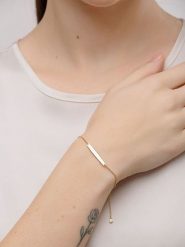 Pandora Pozłacana bransoletka z elementem ozdobnym rozmiar: 18. Żółte bransoletki damskie Pandora, pozłacane. Za 484.31 zł.