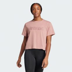 Koszulka Terrex Graphic. Czerwone bluzki damskie Adidas, l, bez wzorów, z bawełny, bez kołnierzyka, bez ramiączek. W wyprzedaży za 95.40 zł.