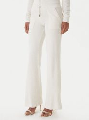 Juicy Couture Spodnie dresowe Layla JCSEBJ001G Beżowy Regular Fit. Brązowe spodnie dresowe damskie Juicy Couture, xl, bez wzorów, z dresówki. Za 349.99 zł.