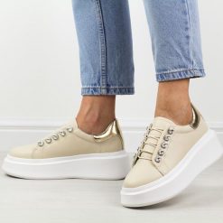Beżowe skórzane sneakersy damskie DiA 628. Brązowe obuwie sportowe damskie DiA, na jesień, ze skóry, bez zapięcia. Za 259.00 zł.