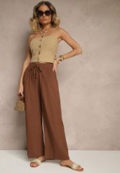 Brązowe Spodnie High Waist Szerokie z Bawełny Wiązane w Pasie z Gumką w Talii Yaslio. Brązowe spodnie materiałowe damskie Renee, bez wzorów, z bawełny. Za 39.99 zł.