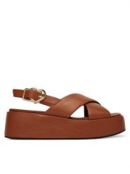 LOVE MOSCHINO Sandały JA16137I0OIA0200 Brązowy. Brązowe sandały damskie Love Moschino, bez wzorów, ze skóry, bez obcasa, na koturnie, bez zapięcia. Za 919.99 zł.