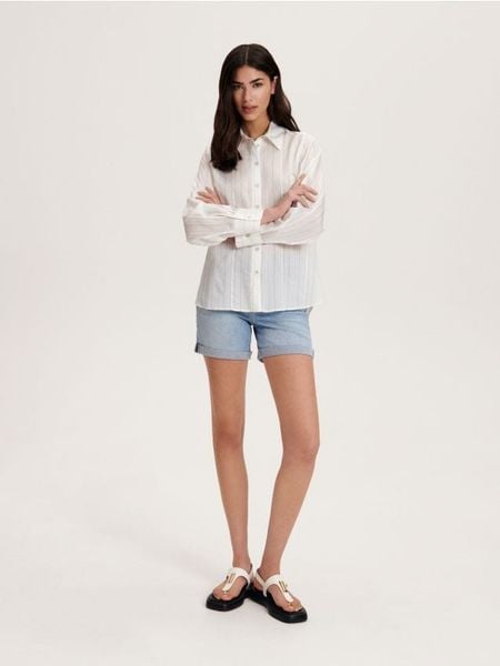 Koszula w paski - złamana biel. Koszule damskie Reserved, l, bez wzorów, z tkaniny, bez kołnierzyka, bez ramiączek. W wyprzedaży za 39.99 zł.