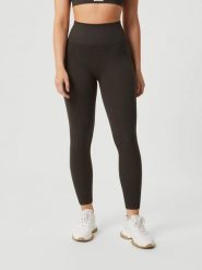 Bjorn_borg STUDIO SEAMLESS RIBBED TIGHTS bezszwowe prążkowane legginsy – PEAT. Brązowe legginsy damskie Björn Borg, xs, bez wzorów, prążkowane. Za 307.50 zł.