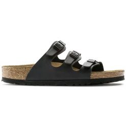 Klapki damskie BIRKENSTOCK Florida Soft Footbed Birko-Flor. Czarne klapki damskie Birkenstock, bez wzorów, ze skóry, bez obcasa, bez zapięcia. Za 429.99 zł.