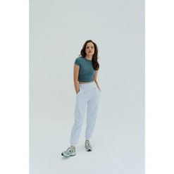 Koszulka treningowa do jogi Moonholi Timeless z krótkim rękawem. Szare koszulki sportowe damskie MOONHOLI, xl, bez wzorów, bez ramiączek, na jogę i pilates. Za 259.00 zł.