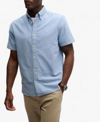 Superdry Koszula Preppy Oxford krótki rękaw Sky Blue Chambray. Niebieskie koszule damskie Superdry, uniwersalny, bez wzorów, z bawełny, eleganckie, bez kołnierzyka, bez ramiączek. Za 282.95 zł.