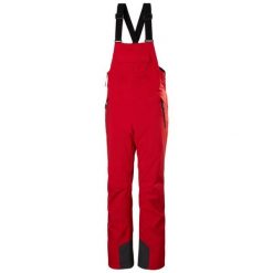Damski kombinezon narciarski Helly Hansen Legendary Bib. Czerwone kombinezony damskie Helly Hansen, bez wzorów, sportowe, bez kołnierzyka, bez ramiączek. Za 1,027.00 zł.