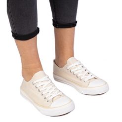 Brązowe klasyczne damskie trampki beżowy. Brązowe trampki damskie bez wzorów, z jeansu, bez zapięcia. Za 75.95 zł.