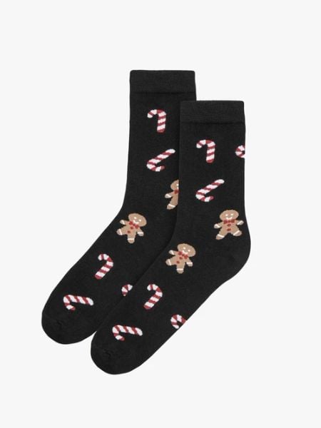 Czarne skarpety bawełniane w świąteczny print. Czarne skarpetki damskie Ryłko, bez wzorów, z bawełny. Za 24.99 zł.