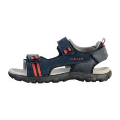 Sandały GEOX JR SANDAL STRADA A Niebieski. Niebieskie sandały damskie Geox, bez wzorów, ze skóry, bez obcasa, bez zapięcia. Za 152.99 zł.