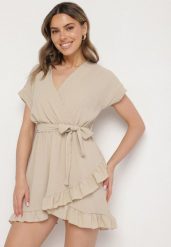 Beżowa Rozkloszowana Sukienka Ozdobiona Falbanami i Paskiem Zivene. Brązowe sukienki damskie Born2be, bez wzorów, eleganckie, bez ramiączek. W wyprzedaży za 55.24 zł.