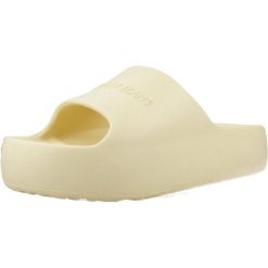 Sandały TOMMY JEANS CHUNKY POOL SLIDE ESS Żółty. Żółte sandały damskie Tommy Hilfiger, bez wzorów, z gumy, bez obcasa, bez zapięcia. Za 253.99 zł.