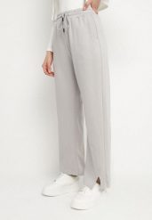 Szare Dresowe Spodnie o Szerokim Kroju z Wysokim Stanem ze Sznurkiem Zaliona. Szare spodnie dresowe damskie Born2be, l, bez wzorów, z dresówki. Za 49.99 zł.