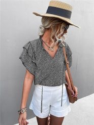 Ariel Tesoro Bluzka w kolorze czarnym rozmiar: 38. Czarne bluzki damskie Ariel Tesoro, bez wzorów, bez kołnierzyka, bez ramiączek. Za 105.63 zł.