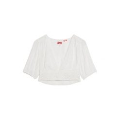 Koszulka damska z koronkowym wykończeniem Superdry Ibiza. Białe bluzki damskie Superdry, l, bez wzorów, z koronki, boho, bez kołnierzyka, bez ramiączek. Za 284.00 zł.