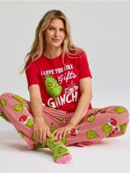 Bawełniana piżama dwuczęściowa Grinch - czerwony. Czerwone piżamy damskie Sinsay, bez wzorów, z bawełny, bez ramiączek. Za 49.99 zł.