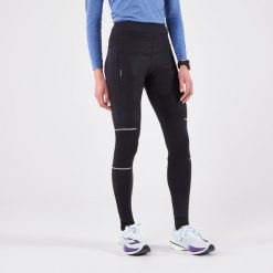 Legginsy do biegania damskie Kiprun Warm Rain ocieplane. Czarne legginsy damskie KIPRUN, xs, bez wzorów, z elastanu. Za 189.99 zł.
