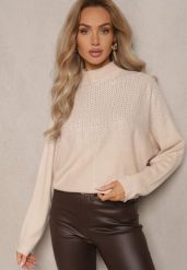 Beżowy Golf o Kroju Oversize z Eleganckim Cyrkoniowym Zdobieniem przy Dekolcie Melirra. Brązowe golfy damskie Renee, z aplikacjami, bez ramiączek. Za 84.99 zł.