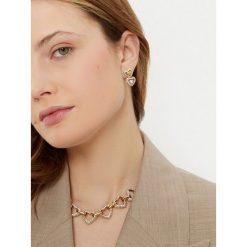 Kolczyki Guess. Żółte kolczyki damskie Guess, złote. Za 199.99 zł.