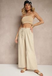 Beżowe Spodnie High Waist Szerokie z Bawełny Wiązane w Pasie z Gumką w Talii Yaslio. Brązowe spodnie materiałowe damskie Renee, bez wzorów, z bawełny. Za 39.99 zł.
