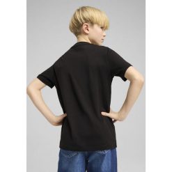 Młodzieżowa koszulka Graphics IV PUMA Black. Czarna koszulki damskie Puma, m, bez wzorów, z gumy, bez kołnierzyka, bez ramiączek. Za 97.25 zł.
