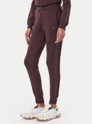 Guess Spodnie dresowe V2YB18 K7UW2 Brązowy ciemny Regular Fit. Brązowe spodnie dresowe damskie Guess, s, z aplikacjami, z dresówki. Za 364.99 zł.