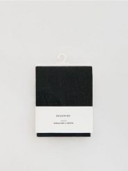 Rajstopy z metalizowaną nitką 30 DEN - czarny. Czarne rajstopy Reserved, bez wzorów. Za 39.99 zł.