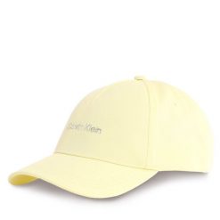 Czapka z daszkiem Calvin Klein. Żółte czapki z daszkiem damskie Calvin Klein, bez wzorów. Za 89.99 zł.