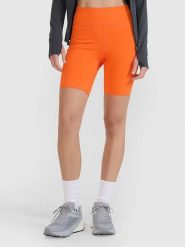 4F Szorty funkcyjne w kolorze pomarańczowym rozmiar: XL. Pomarańczowe spodenki sportowe damskie 4F, xl, bez wzorów, z materiału, na fitness i siłownię. Za 89.95 zł.