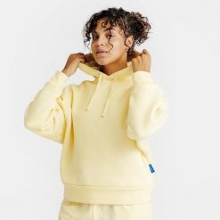 Bluza z kapturem damska Elementals. Żółte bluzy damskie Decathlon, xl, bez wzorów, z bawełny, z kapturem. Za 179.99 zł.