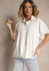 Biała Koszula z Wiskozą Ozdobiona Falbankami Oleldi. Białe koszule damskie Renee, bez wzorów, z jeansu, eleganckie, bez kołnierzyka, bez ramiączek. Za 59.99 zł.