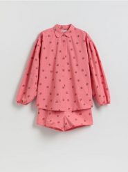 Dwuczęściowa piżama we wzory - intenstywna czerwień. Czerwone piżamy damskie Reserved, bez wzorów, z bawełny, bez ramiączek. Za 149.99 zł.