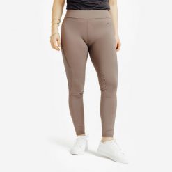 Legginsy jeździeckie damskie ciepłe z silikonowym lejem. Czarne legginsy damskie FOUGANZA, s, bez wzorów, z materiału. Za 199.99 zł.