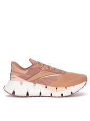 Reebok Buty do biegania Floatzig 1 100206732 Różowy. Czerwone obuwie sportowe damskie Reebok, z materiału, bez zapięcia, do biegania. Za 549.99 zł.