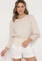 Jasnobeżowa Bluzka z Wiskozą i Ściągaczami Velio. Brązowe bluzki damskie Born2be, uniwersalny, bez wzorów, z jeansu, eleganckie, bez kołnierzyka, bez ramiączek. Za 59.99 zł.