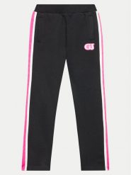 Guess Spodnie dresowe J4YQ12 KA6R4 Czarny Relaxed Fit. Czarne spodnie dresowe dziewczęce Guess, z aplikacjami, z bawełny. Za 99.99 zł.