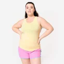Koszulka fitness damska Domyos bez rękawów. Żółte koszulki damskie DOMYOS, l, bez wzorów, z elastanu, bez kołnierzyka, bez ramiączek. Za 19.99 zł.