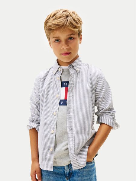 Tommy Hilfiger Koszula Ithaca KB0KB09605 Niebieski Regular Fit. Niebieskie koszule chłopięce Tommy Hilfiger, bez wzorów, z bawełny, bez kołnierzyka, bez ramiączek. Za 289.99 zł.